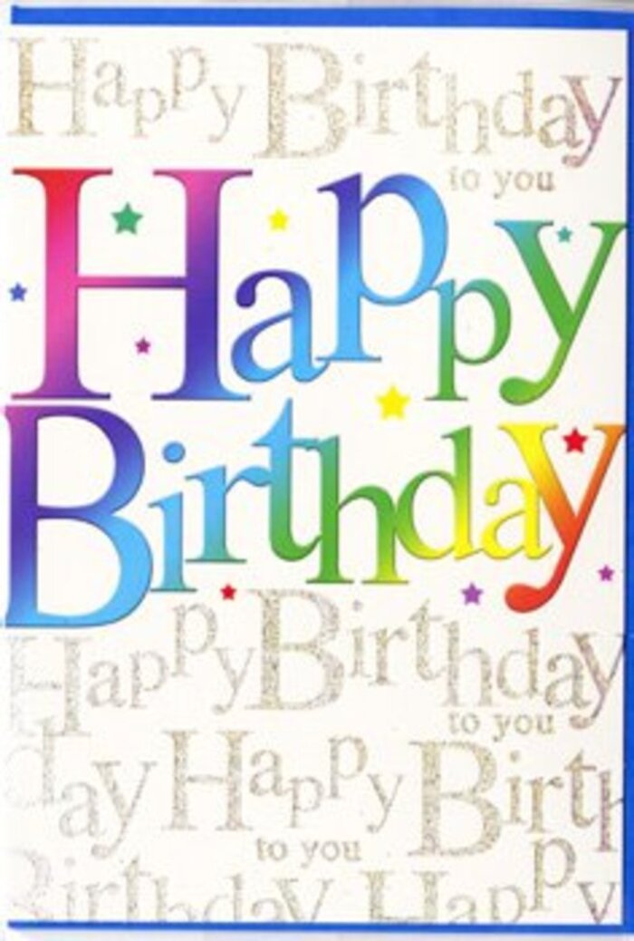 The birthday card pictured here feels like a vibrant slice of celebration lifted right from the heart of the West End, not far from Charing Cross station. Across the centre, the words Happy Birthday are presented in bold, confident letters that span from side to side, drawing the eye instantly. Each letter carries a soft gradient that traverses a full spectrum of colour: deep ruby and rose at one end, slipping into velvety plum, rich violet, and midnight blue, then brightening to teal, turquoise, and fresh grass green, and finally warming into shades of honey gold and pale, buttery yellow. The blending is gentle and painterly, evoking the way colours merge in a carefully constructed florist's display, where no single bloom dominates yet all are vivid. Behind this primary message, the card is covered in rows of tiny, elegant script repeating Happy Birthday to you in fine metallic gold. These repeated lines of cursive text are evenly spaced, creating the impression of gentle waves of wishes rippling out from the main sentiment, catching the light in a subtle, refined shimmer-more like polished jewellery in a Covent Garden boutique than loud glitter. Tiny stars, sparkles, and dot accents in rainbow and gold dance around the letters, giving the sense of confetti swirling in the air just after a chorus of happy birthday has been sung. The card's finish appears smooth and slightly satiny, suggesting a pleasing tactile experience if held in hand. The design balances bold colour and delicate detail beautifully, making it an ideal card to pair with a colourful bouquet delivered around Charing Cross, Trafalgar Square, or into nearby offices and theatres, when you want the greeting itself to feel like part of the celebration.